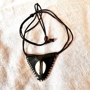 Leather and cowry choker.